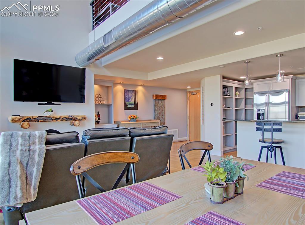 Image 11 of 20: Dining space featuring recessed lighting and light wood-type flooring