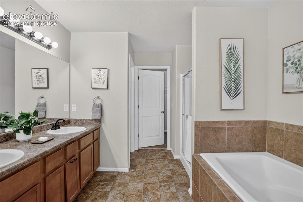 Image 11 of 40: Master Bathroom