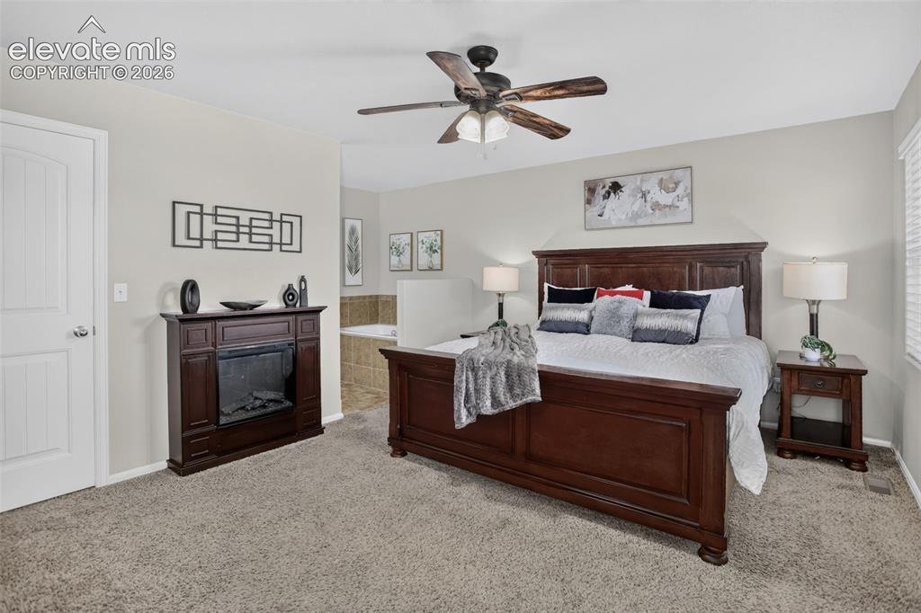 Image 9 of 40: Master Bedroom