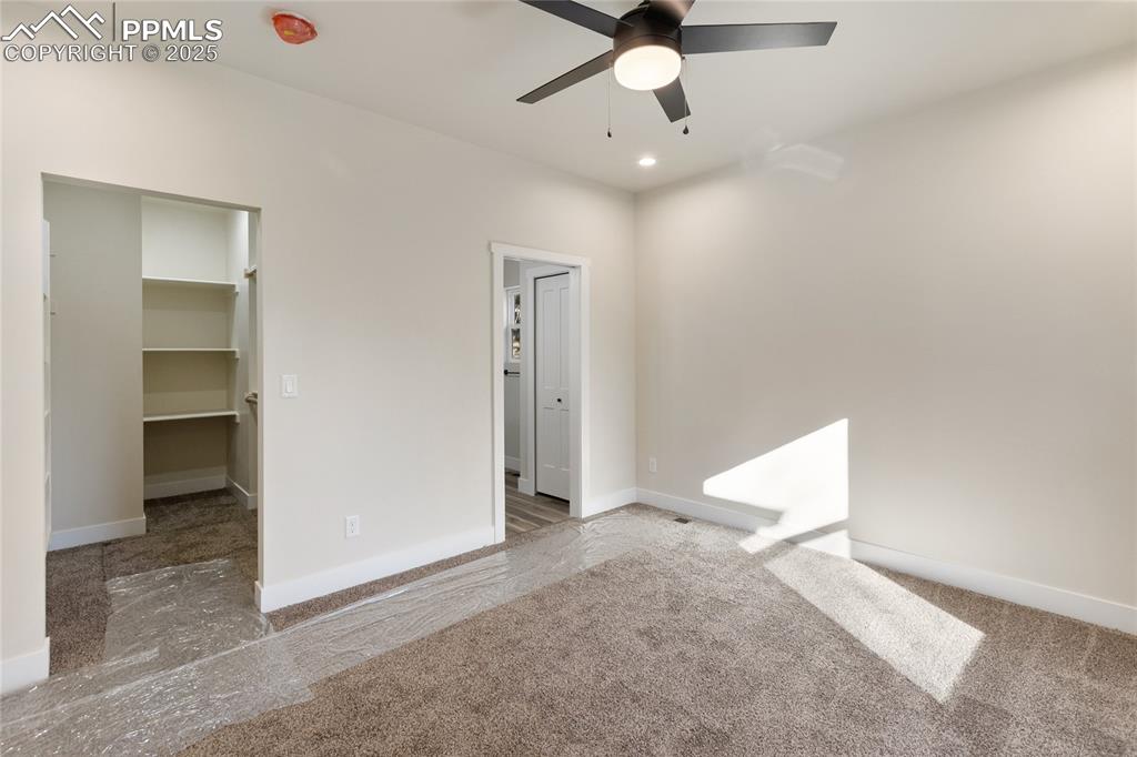 Image 18 of 38: Empty room featuring recessed lighting, a ceiling fan, and carpet