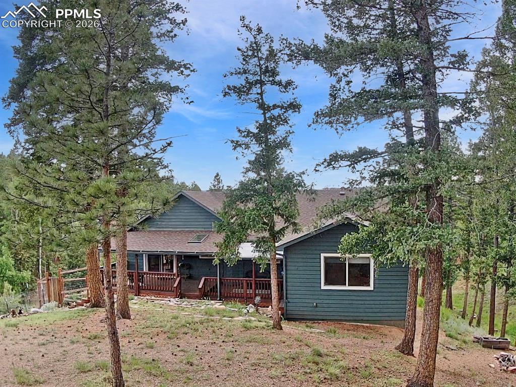 Image 10 of 37: Covered deck with skylight