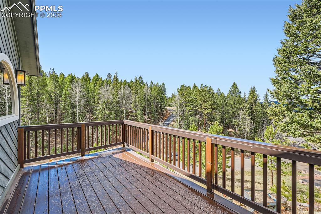 Image 12 of 37: Elevated deck off the front of the home