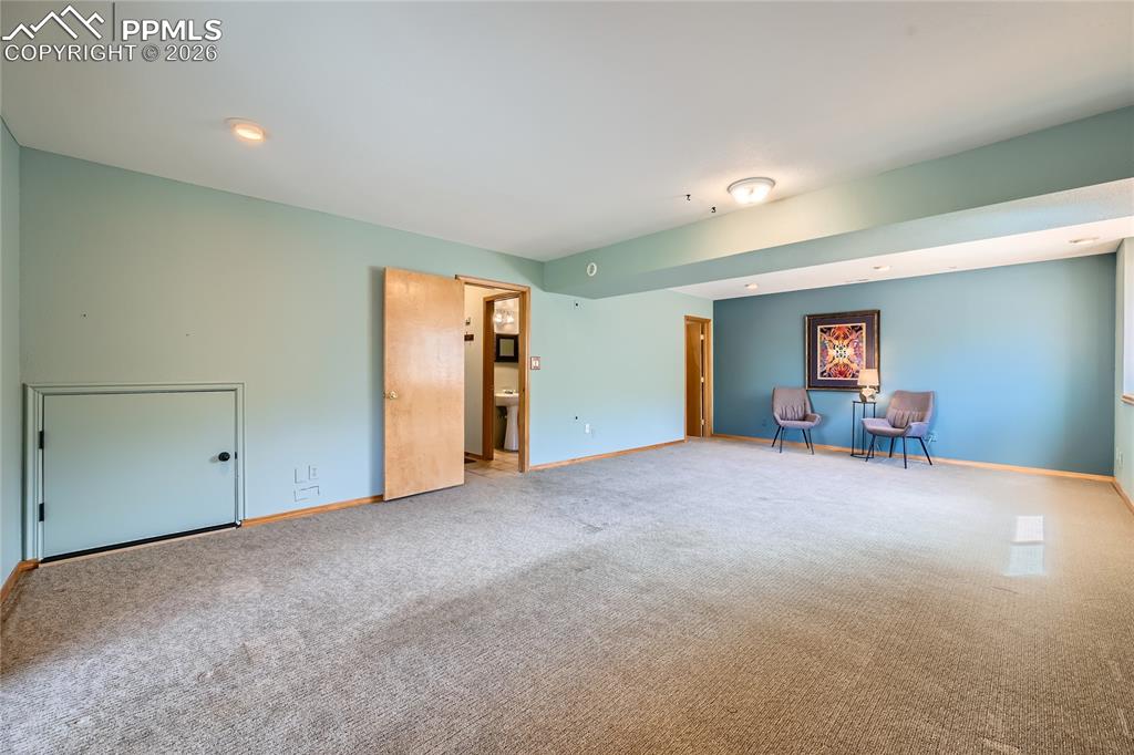 Image 24 of 37: Lower level family room