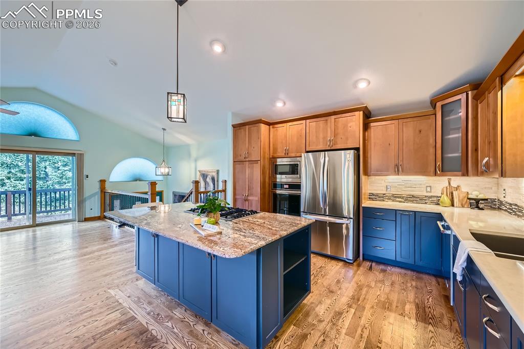 Image 7 of 37: Tastefully designed kitchen with loads of storage space