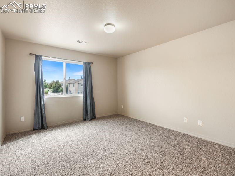 Image 14 of 38: Master Bedroom