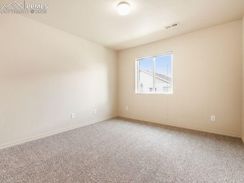 Image 23 of 38: Bedroom