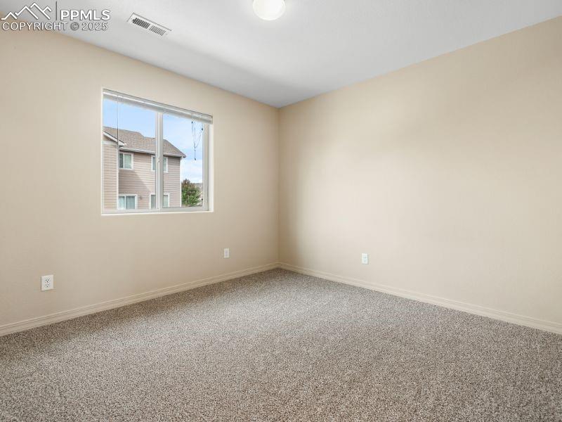 Image 26 of 38: Bedroom