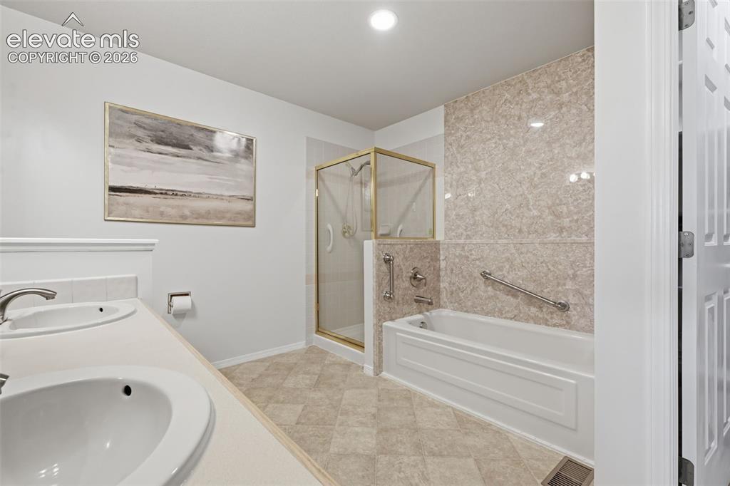 Image 12 of 44: Master Bathroom