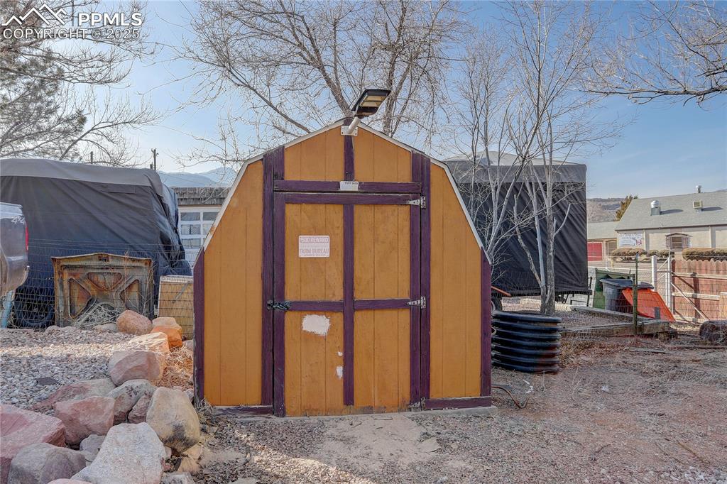Image 12 of 15: Storage shed