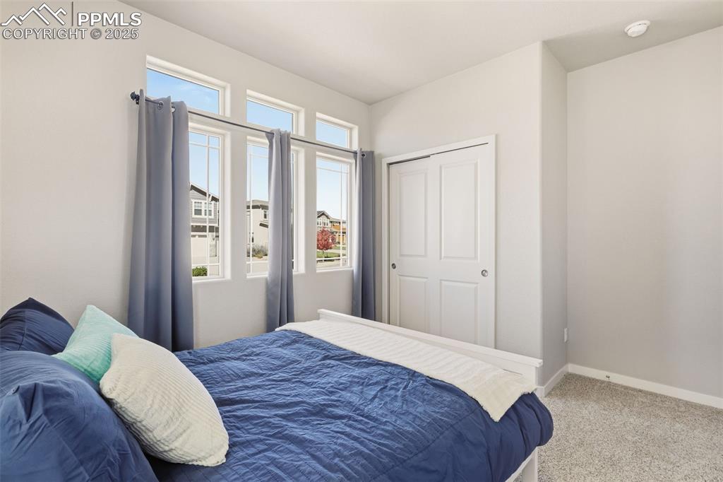 Image 20 of 34: Second bedroom - main level