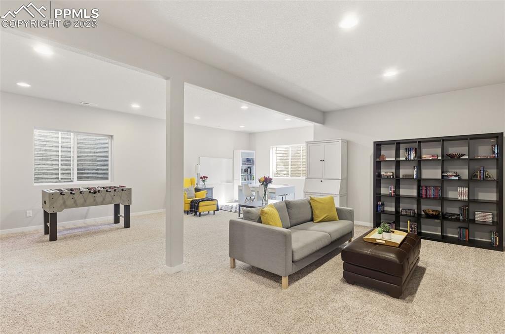 Image 24 of 34: Huge, spacious rec room in the basement