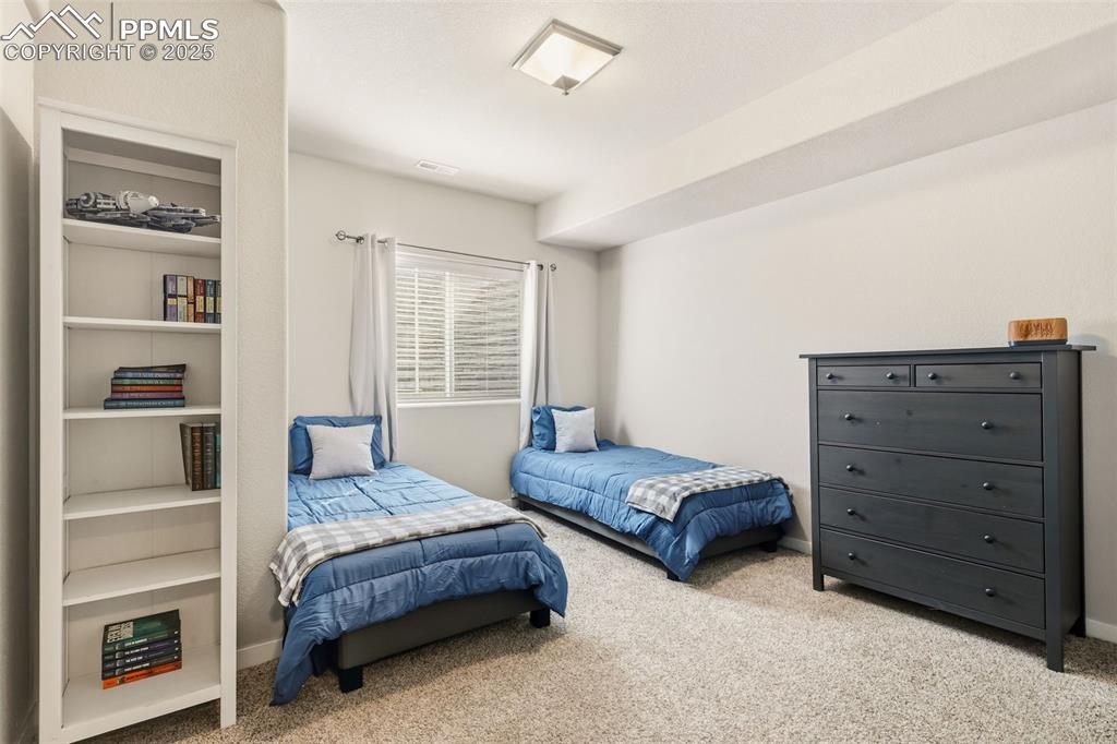 Image 29 of 34: Fifth bedroom - basement