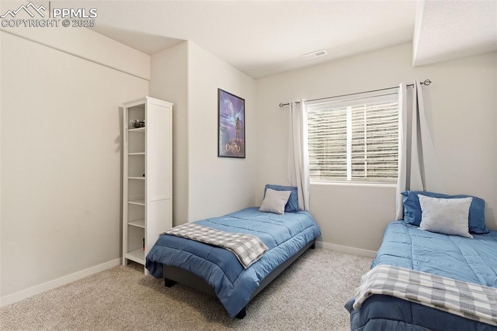 Image 30 of 34: Fifth bedroom - basement