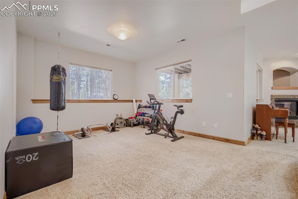 Image 25 of 49: Basement work out flex room 