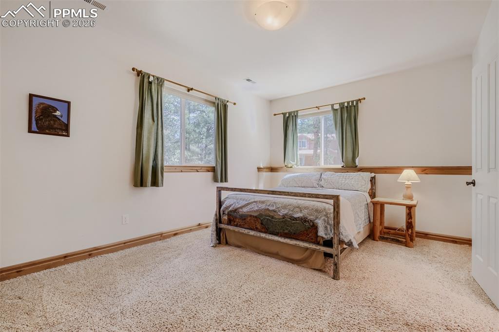 Image 28 of 49: Basement bedroom with Jack & Jill full bath 