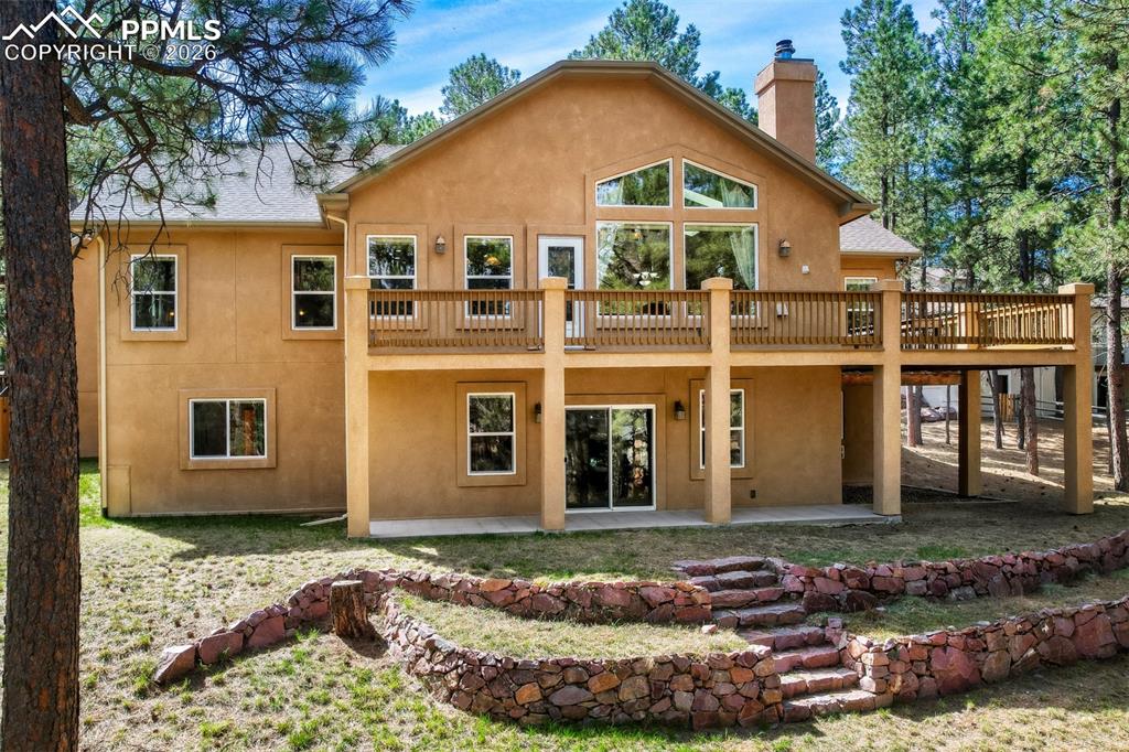 Image 32 of 49: Back of house featuring a patio area 
