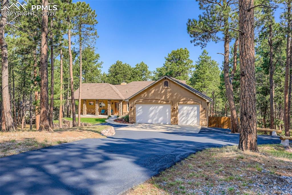 Image 39 of 49: View of front with plenty of guest parking 