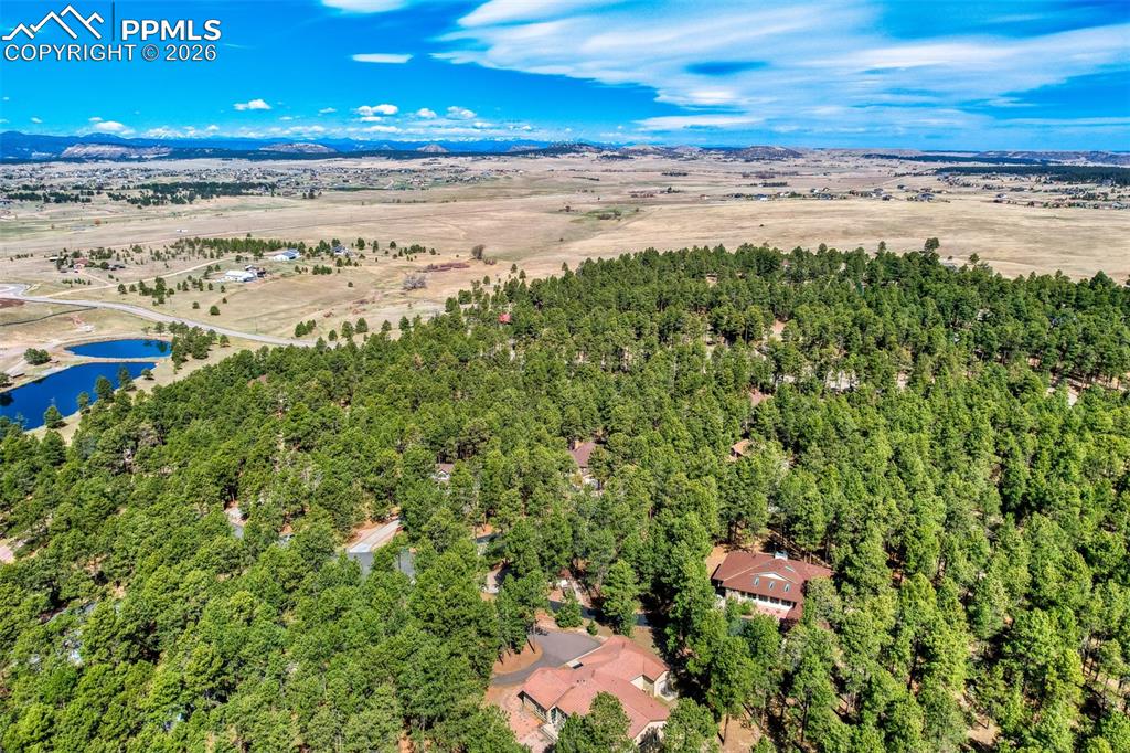 Image 45 of 49: Aerial view of a water and mountain view
