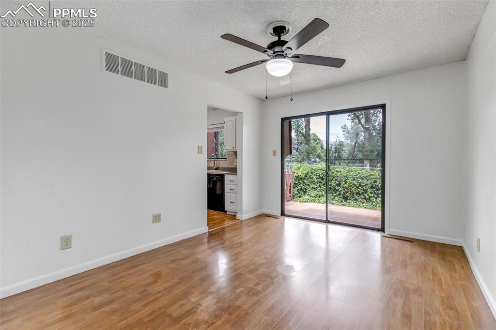Image 12 of 37: Dining Room with Backyard Access