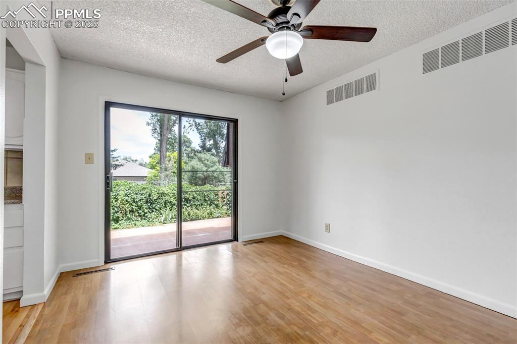 Image 13 of 37: Dining Room with Backyard Access