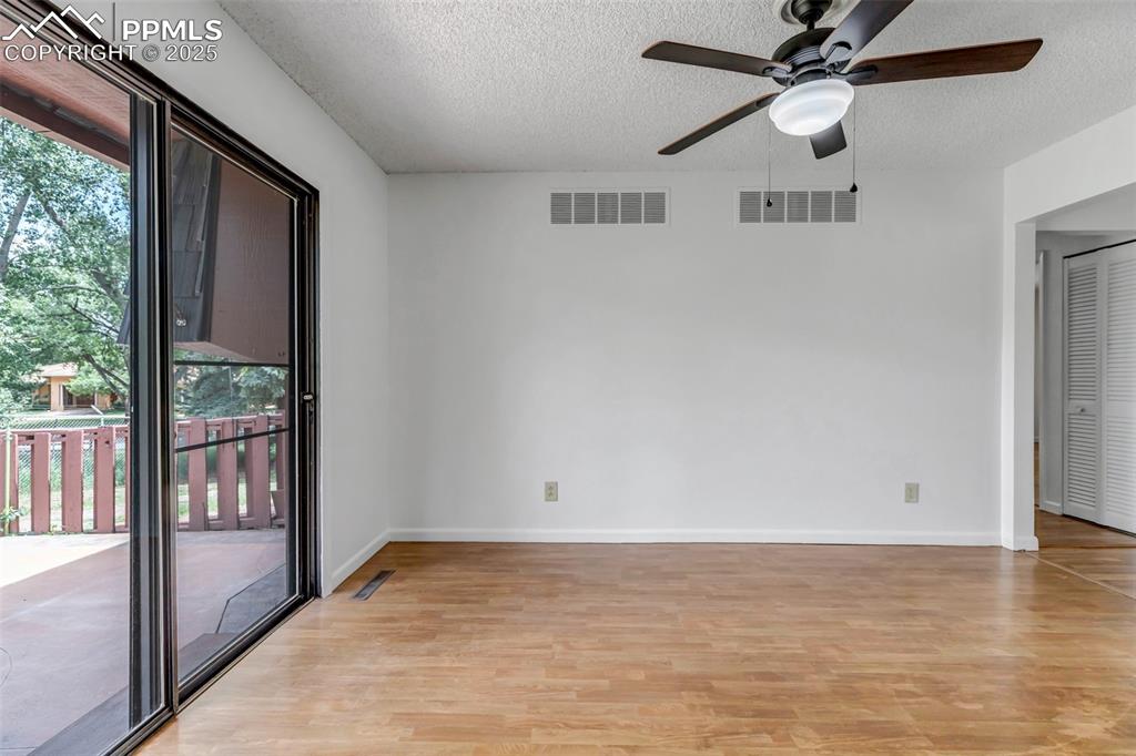 Image 14 of 37: Dining Room with Backyard Access