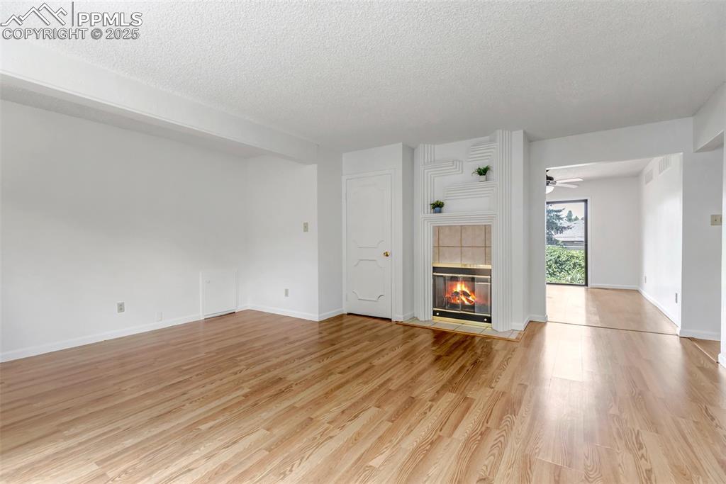 Image 15 of 37: Family room flows into the dining room