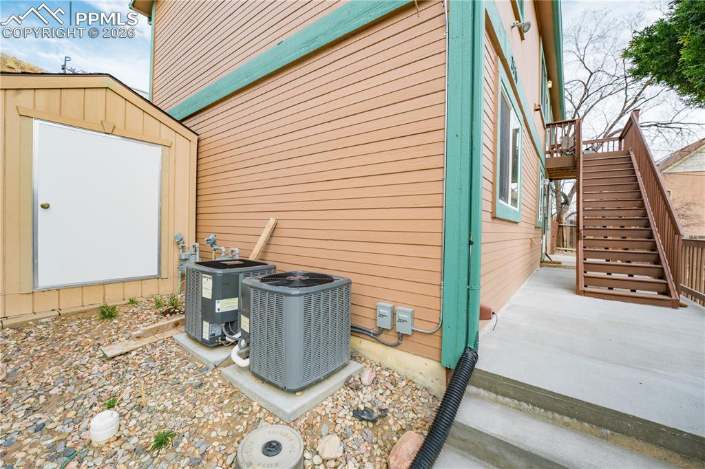 Image 38 of 45: Shed and new A/C units