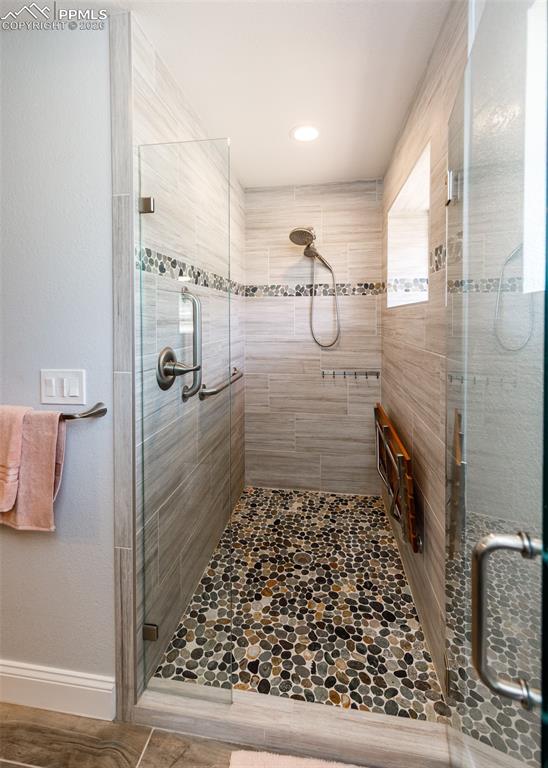 Image 25 of 39: Shower in Primary Bathroom