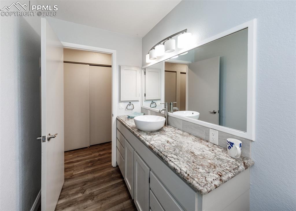 Image 32 of 39: Hallway Bathroom