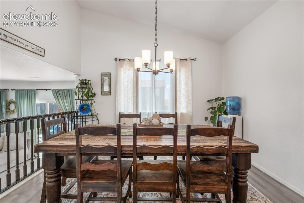 Image 14 of 41: Kitchen with light-toned cabinetry and stone countertops