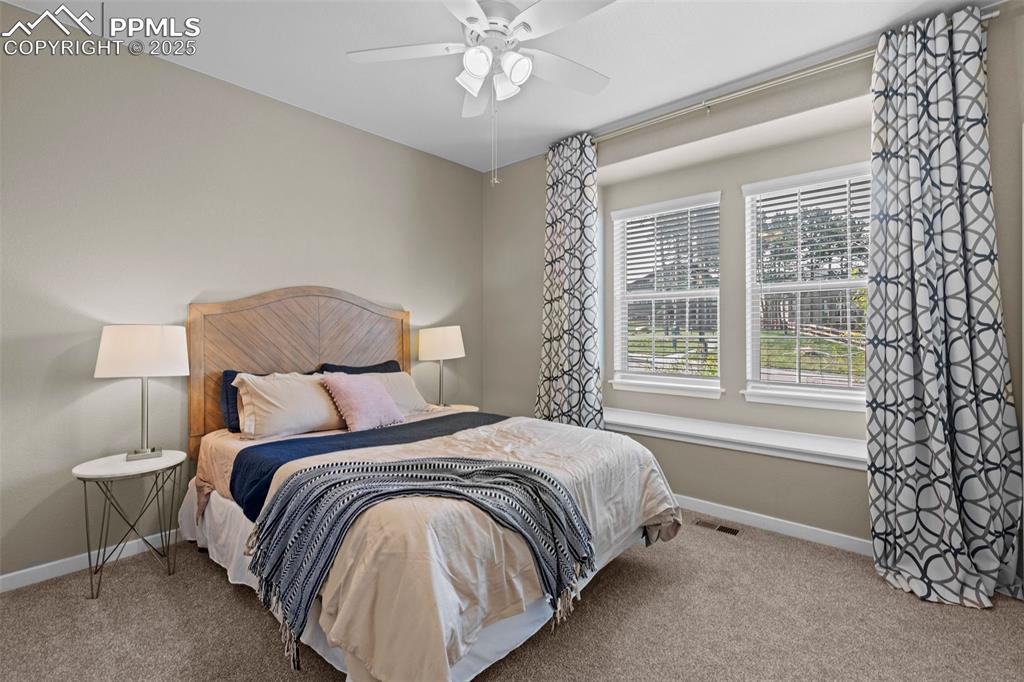 Image 5 of 40: Guest bedroom main floor