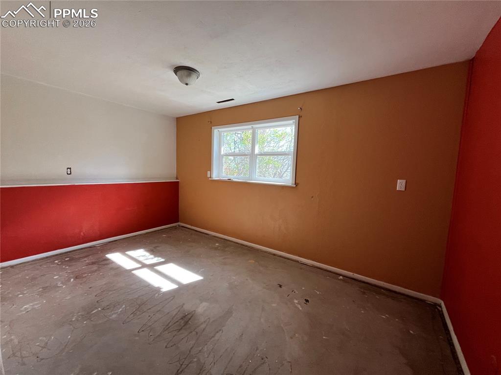 Image 6 of 13: Unfurnished room with baseboards