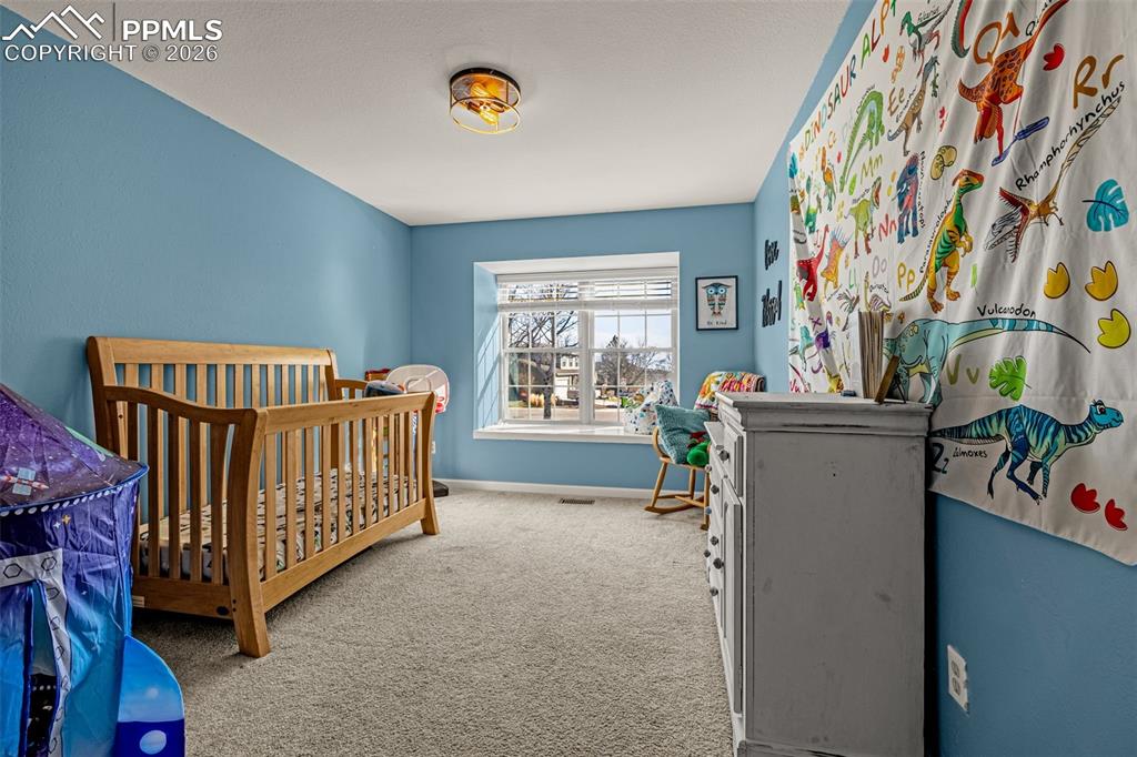 Image 13 of 38: Bedroom