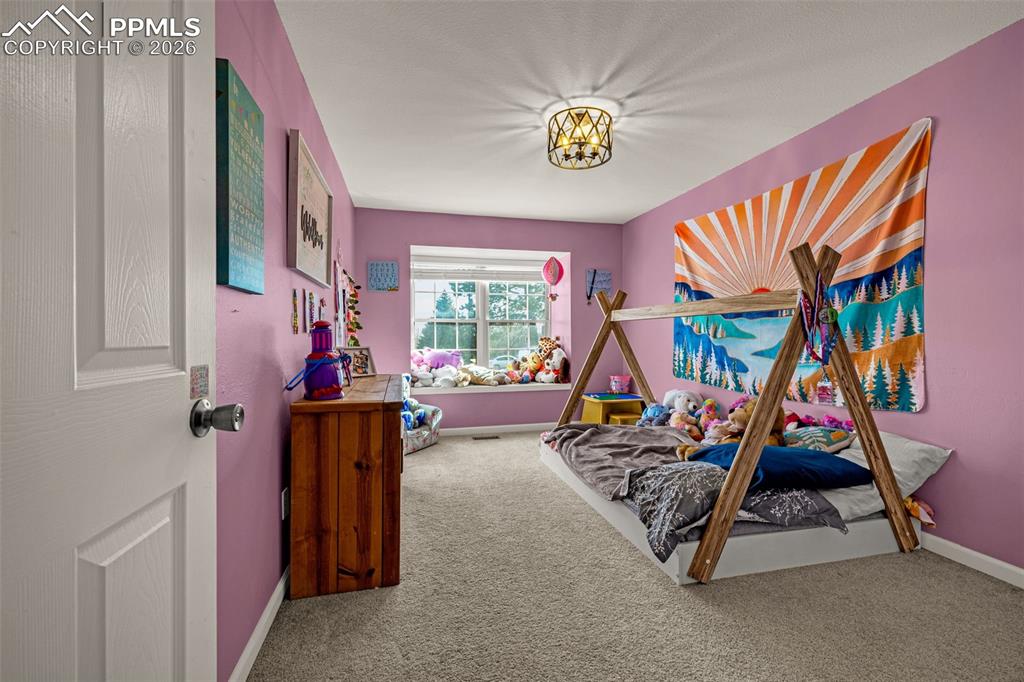 Image 14 of 38: Bedroom