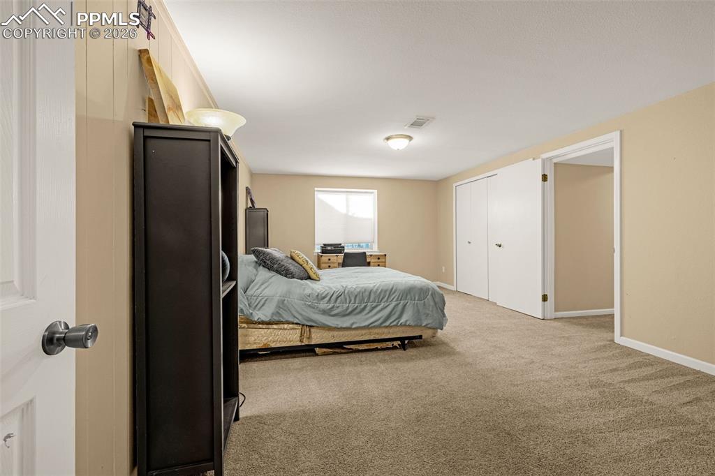 Image 20 of 38: Bedroom