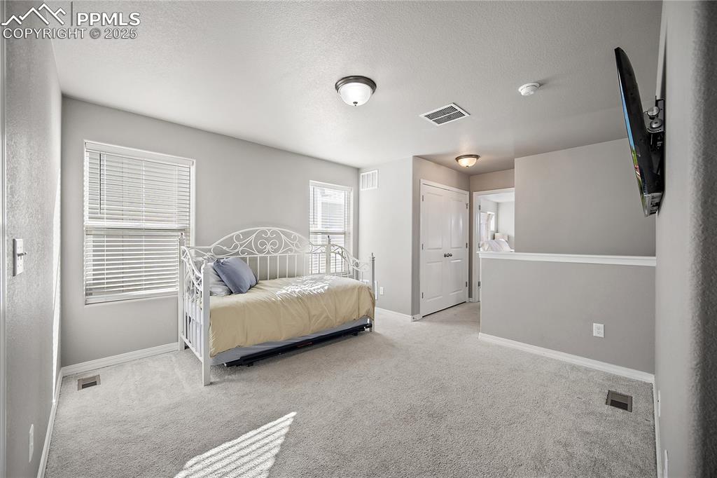 Image 17 of 36: Upstairs loft space that boasts endless possibilities