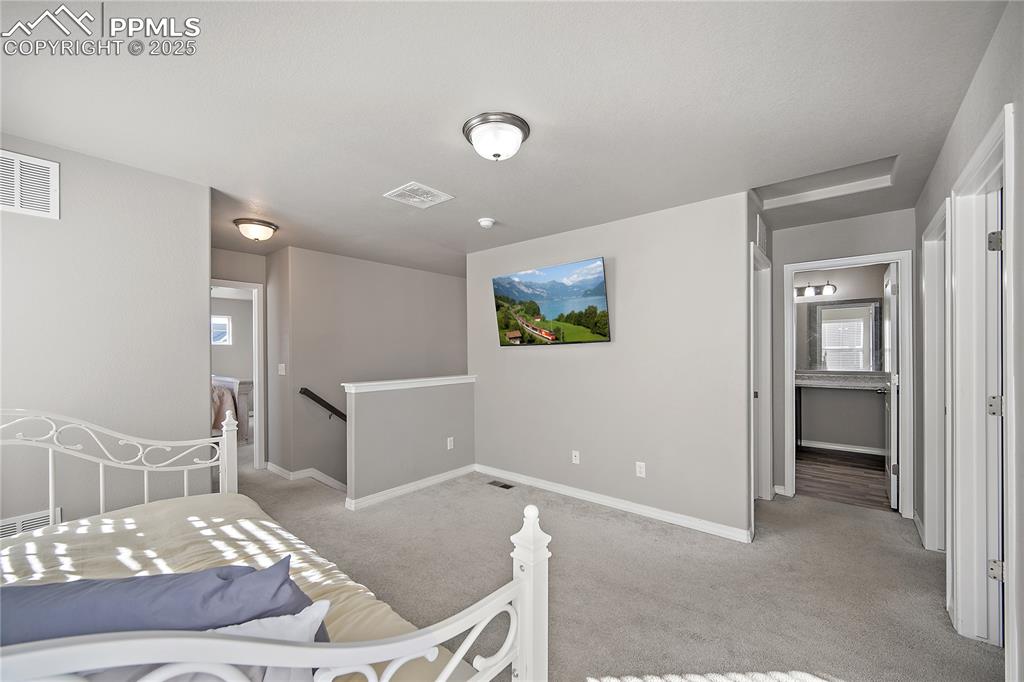 Image 18 of 36: Bedroom