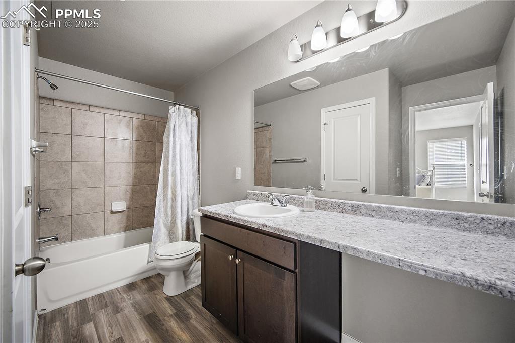 Image 29 of 36: Upstairs full bath