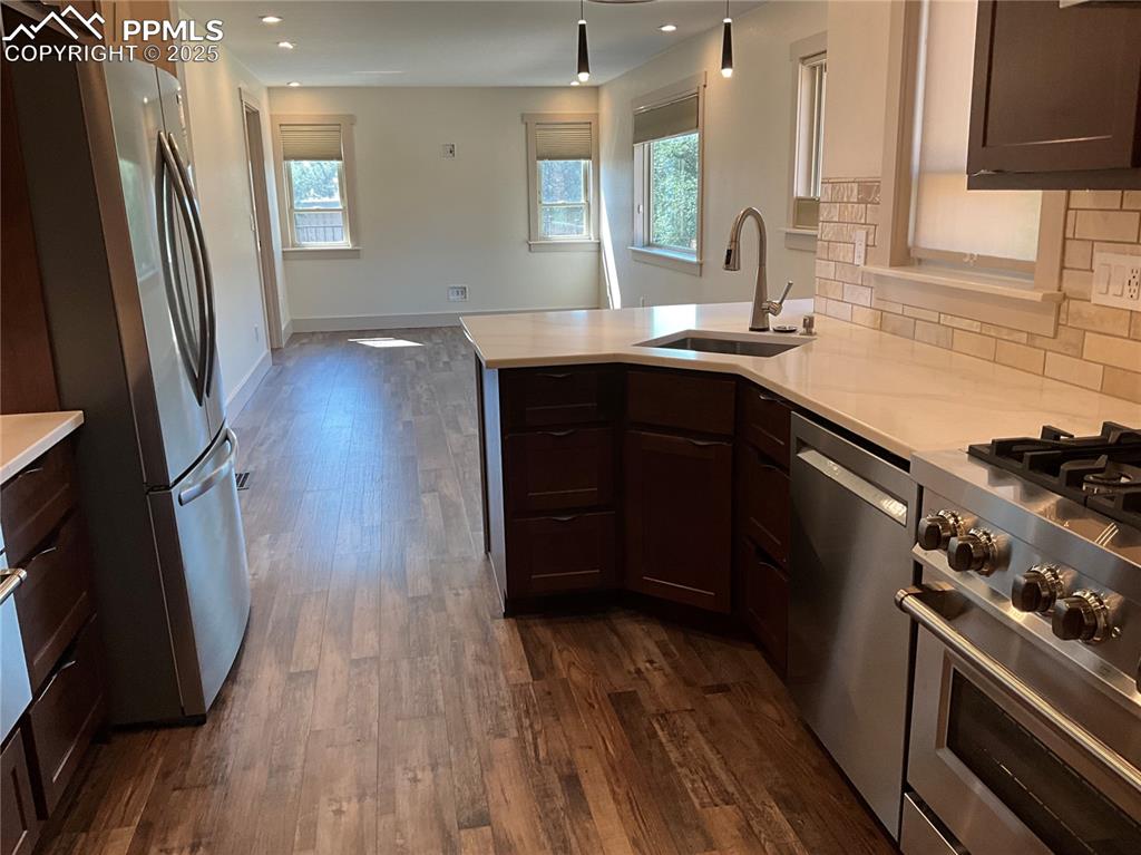 Image 12 of 50: Kitchen featuring appliances with stainless steel finishes, Cherry Charcoal