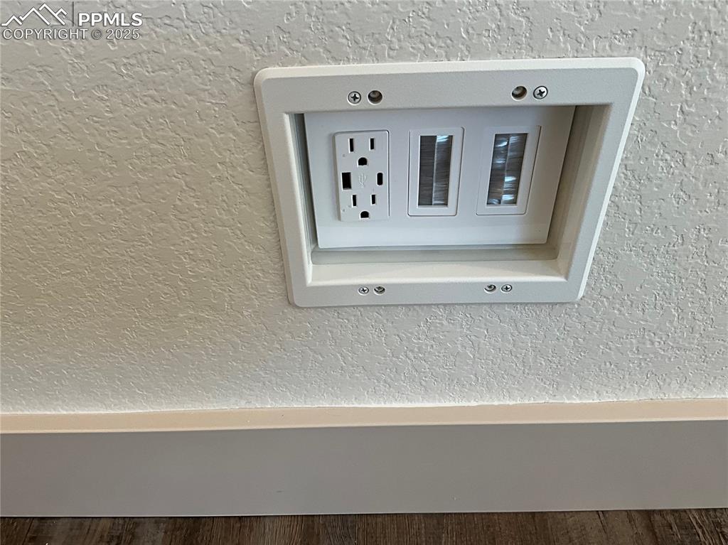 Image 46 of 50: Detailed view in wall tamper resistant USB wall outlets through out this ho