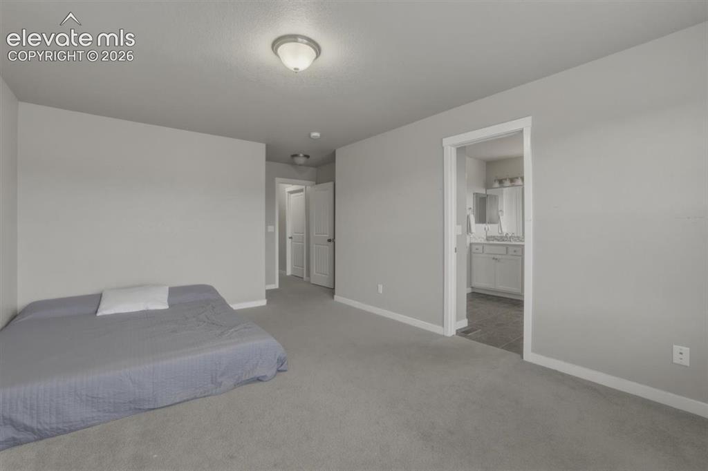 Image 10 of 25: Large Primary Bedroom