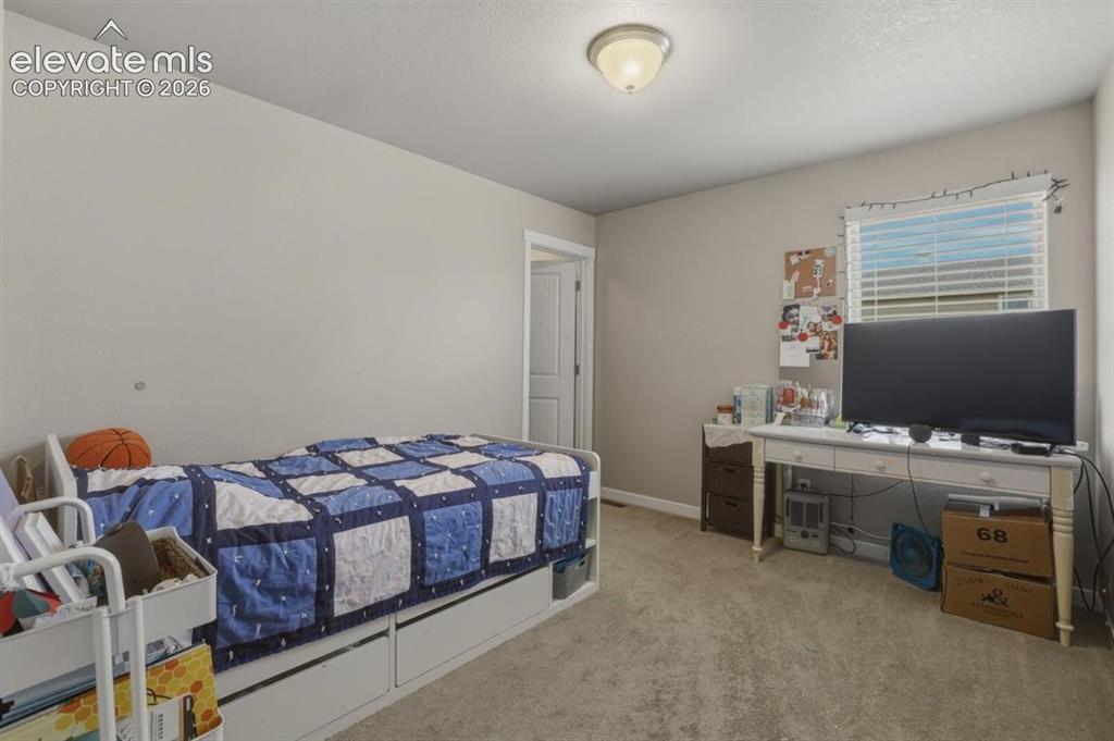 Image 14 of 25: Second Bedroom