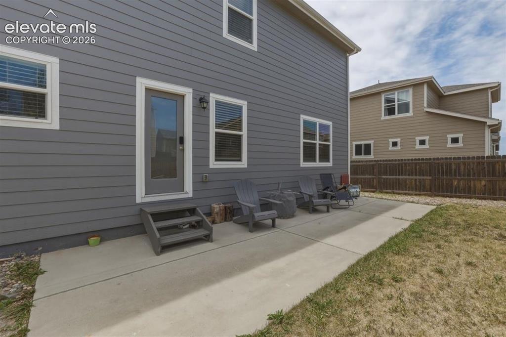 Image 21 of 25: Large Concrete Patio