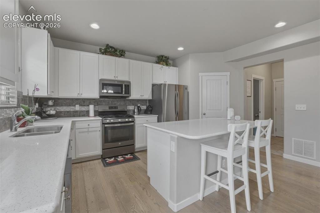 Image 6 of 25: Quartz Countertops, Island