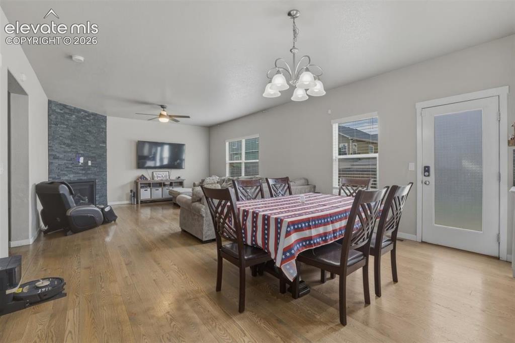 Image 7 of 25: Dining Area walks out to Backyard.