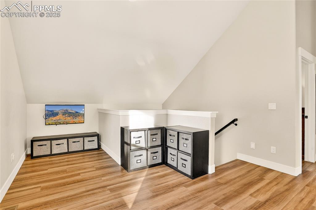 Image 26 of 50: Upstairs loft is spacious and ready for fun family time