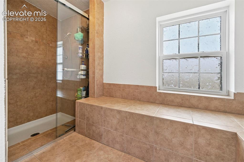 Image 23 of 42: oversized walk in shower 