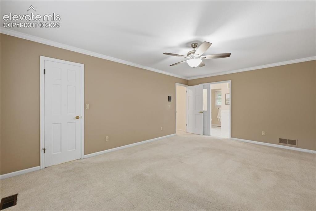 Image 19 of 49: Primary bedroom upper level with huge on-suite bathroom and massive walk in