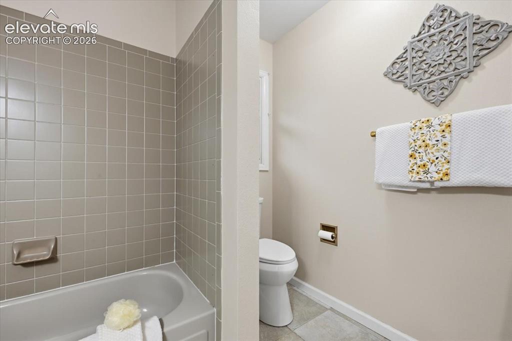 Image 28 of 49: upper level bathroom newly painted cabinet and knobs, fixtures, lighting, o
