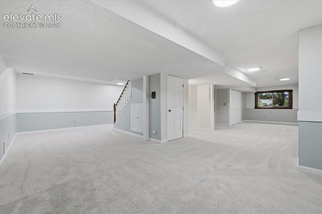 Image 34 of 49: Receration area in basement
